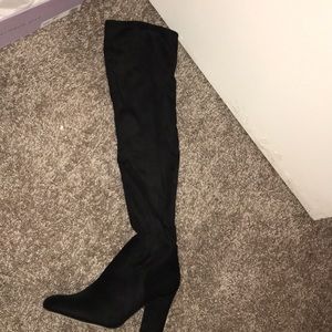 Thigh high black boot